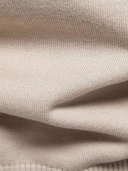 Cardigan en maille à col zippé uni